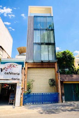 TOÀ NHÀ ỐP KÍNH – 42D Hoa Đào - Phú Nhuận - DTSD 450m2 sàn