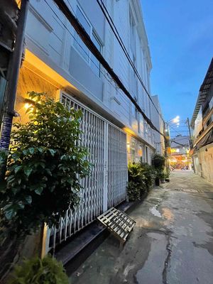 NHÀ HẺM XE HƠI SÁT MẶT TIỀN LÊ VĂN THỌ P9 GÒ VẤP NGAY CV K HOA