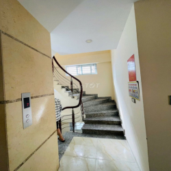 TÒA NHÀ VĂN PHÒNG NGUYỄN KHANG RỘNG 70M XÂY 7 TẦNG THÔNG SÀN THANG MÁY