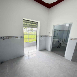 Nhà trệt lửng mới 99% KDC Hồng Loan