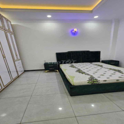 cho thuê nhà 4 tầng Full Nội Thất có 4pn 5wc hẻm xe hơi. Bình Tân