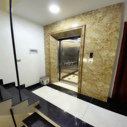 Cho thuê căn hộ full đồ 50m2, có hầm để xe, thang máy, mặt đường lớn