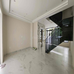 Cho thuê 1 trệt 1 lầu nhà mới 6x17m, có hầm để xe, máy lạnh giá 25tr